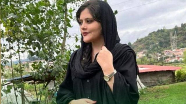 Mahsa Amini: Women take headscarves off in protest at funeral