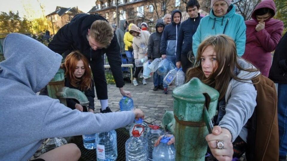 Ukraine war: Kyiv locals queue for water after Russian strikes